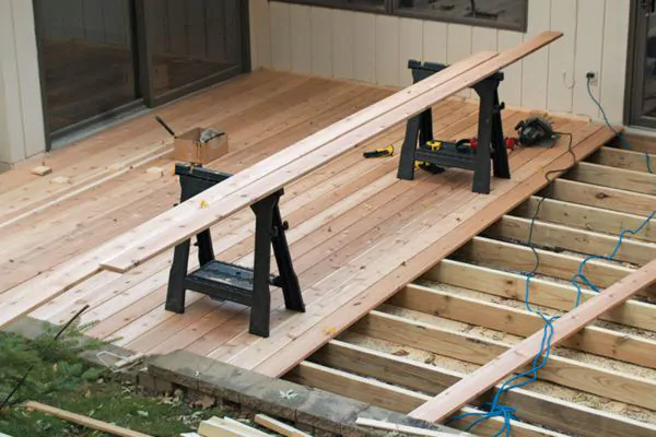 Installing Decking Boards - Michigan Deck Builders