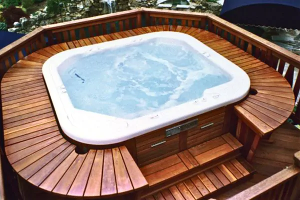 hot tub with wooden stairs