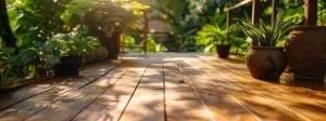 an inviting deck of the rich, best wood for decks, bathed in warm sunlight and surrounded by lush greenery